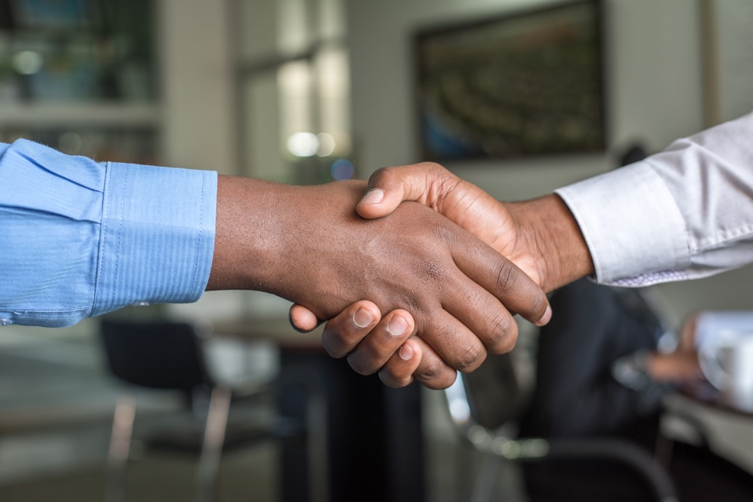 Freelancer negotiating with client over contract and rate, confident expression