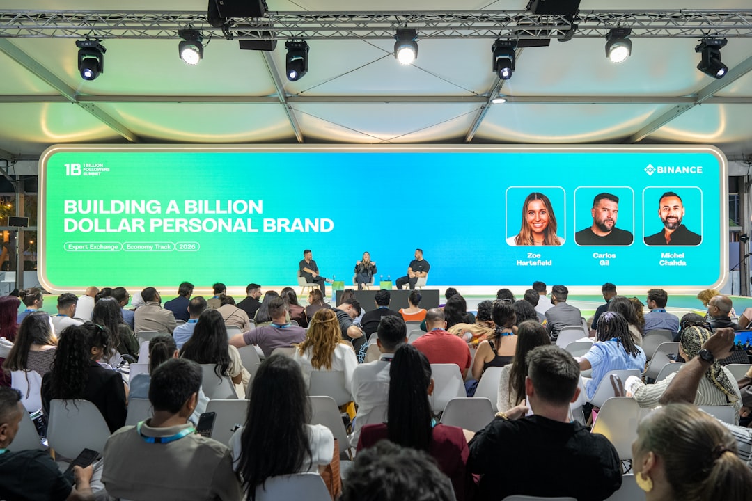 Freelancer building personal brand with laptop and branding elements