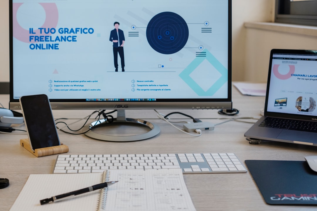 Freelancer reviewing rate increase proposal on laptop at modern desk